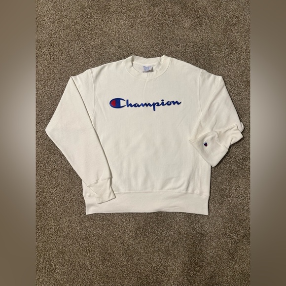 Champion Other - White champion sweater with blue embroidered logo
